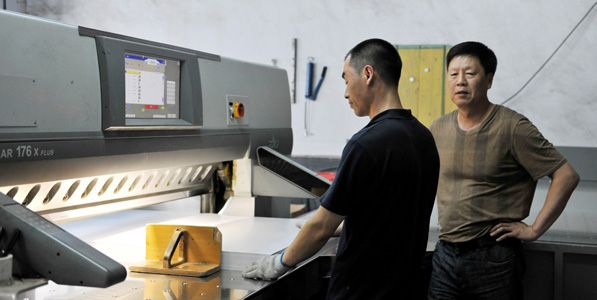 Mr. Zhang Baolin (right), CEO of Bo Shi Heng in front of the POLAR 176