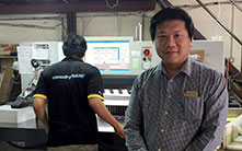 Brian Poon Weng Chiu, CEO e-print, in front of his POLAR N 115 PRO