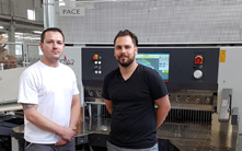 Managing director Richard Wenig (right) and Martin Luniak in front of POLAR CuttingSystem 200 PACE