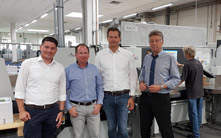 Marc König, postpress specialist of HD Germany, Marco Böke, managing director of druckpartner, Wilfried Munkelt, sales representative of HD Germany and Gerhard Florian, plant manager of druckpartner (fr. left to right)